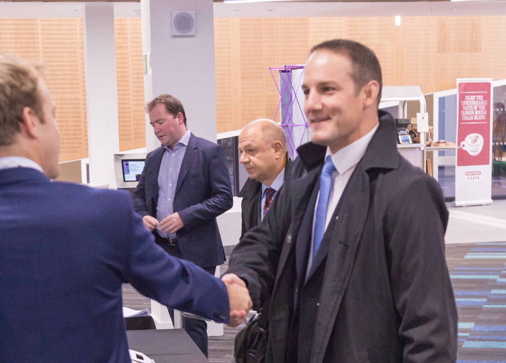 David Grevemberg awarded CBE as Host City 2015 opens